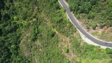 mountain road, aerial mountain road and green forest