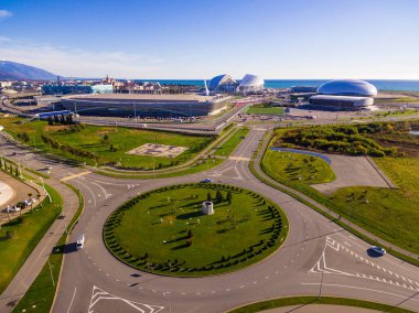 Drone view of Olympic Park and roundabout in Adlersky City District in sunny day, Sochi, Russia