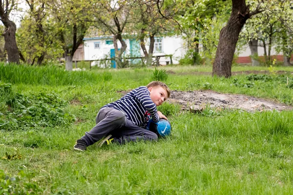 Boy Outdoors Ball Playing Football Grass Spring Village —  Fotos de Stock