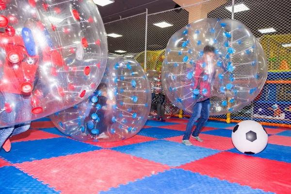 Children Boys Children Center Play Football While Sitting Huge Inflatable — Stockfoto
