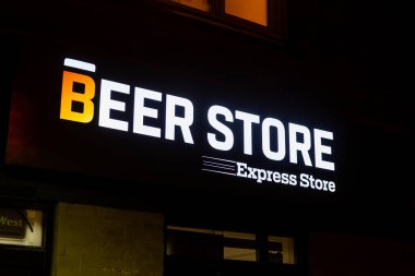 Toronto, ON, Canada  January 2, 2022  View at the Store front sign of The Beer Store. Beer store is a chain of centralized beer retailers in Canada.