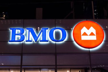 Toronto, ON, Canada  December  22, 2021 The logo and brand sign of Bank of Montreal BMO branch in Toronto, Canada. The Bank of Montreal is a Top 5 Canadian multinational investment bank and financial services company.
