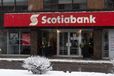Toronto, ON, Canada  December 05, 2021: The logo and brand sign of Scotiabank in downtown Toronto.  The Bank of Nova Scotia  is a Canadian multinational banking and financial services company