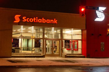 Toronto, ON, Canada  December 05, 2021: The logo and brand sign of Scotiabank in downtown Toronto.  The Bank of Nova Scotia  is a Canadian multinational banking and financial services company