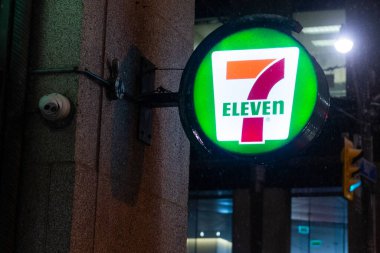 Toronto, ON, Canada  January 2, 2022: The logo of 7-Eleven stores high banner 7-11 is the world's largest franchiser of convenience stores in Canada 