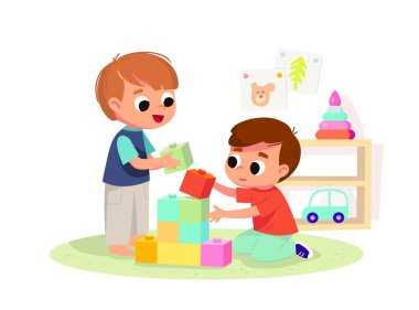 İki çocuk birlikte oynuyor. Eğitici oyuncaklar. Eğitici oyuncaklar. Tasarımcı küpleriyle oynayan, yapıcı setini geliştiren çocuklar.