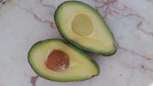 Halves Cut Avocado Stone Fruit Close — Stok Foto