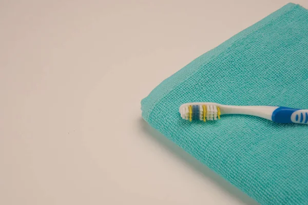 Toothbrush towels hygiene care bath supplies sanitation — Stock Photo, Image