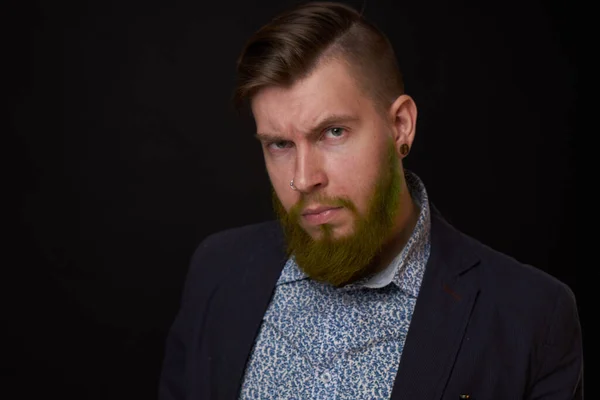 Fashionable business man in a jacket with a beard posing — Stock Photo, Image