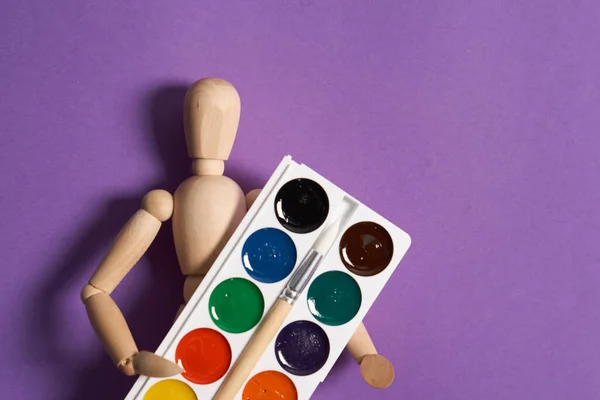 Pincéis de pintura para pintura arte roxo fundo hobby — Fotografia de Stock
