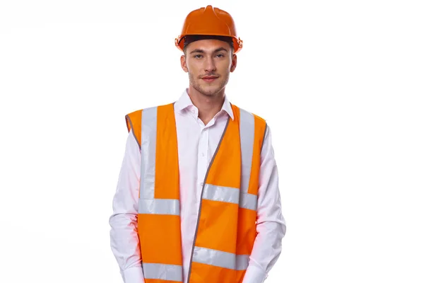 Emotional worker in orange uniform Professional light background — Stock Photo, Image