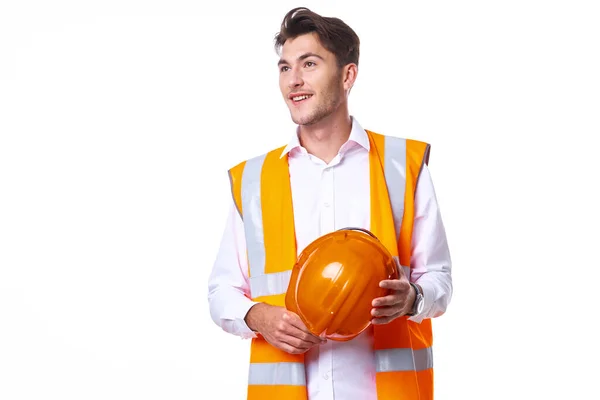 Emotional worker in orange uniform Professional light background — Stock Photo, Image