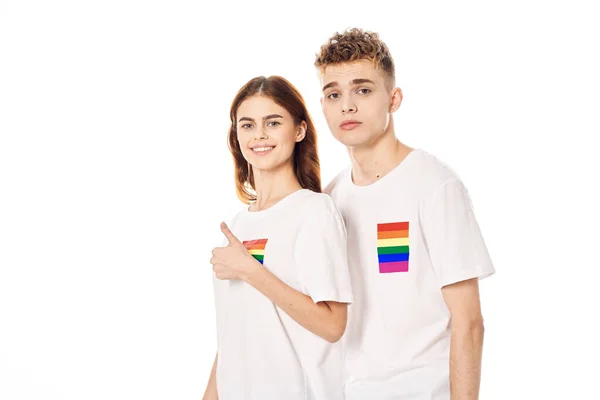 Jong paar lgbt vlag transgender lifestyle licht achtergrond — Stockfoto