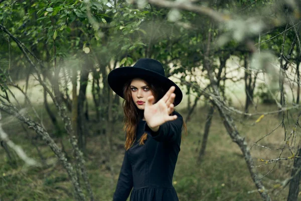 Witch in the woods posing costume halloween gothic style — Stock Photo, Image