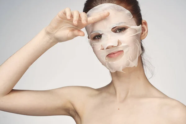 Žena v kosmetické masce obličeje péče o pleť omlazení — Stock fotografie