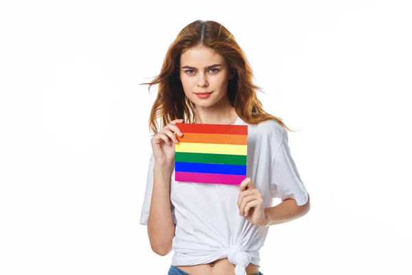 Woman wearing white t-shirt lgbt flag inventor community — ストック写真