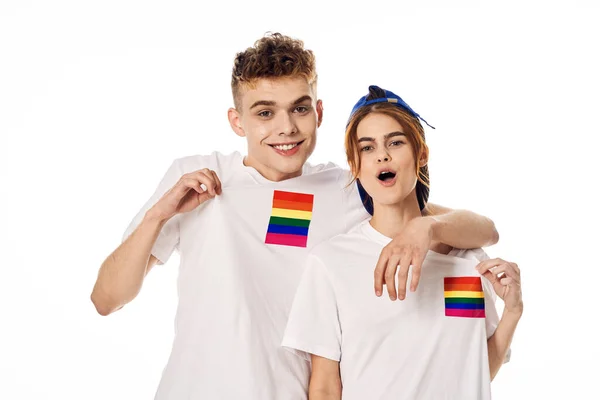 Couple Drapeau lgbt transgenre minorités sexuelles lumière arrière-plan — Photo