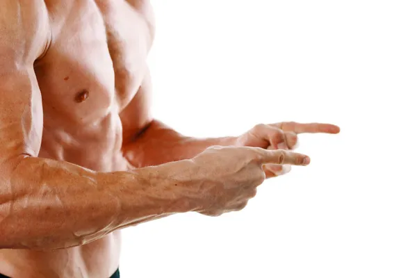 Vücudu kaslı, vücut geliştirme egzersizleri yapan bir adam. — Stok fotoğraf
