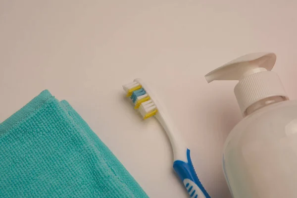 Bathroom items hygiene care toothbrush light background — Stock Photo, Image