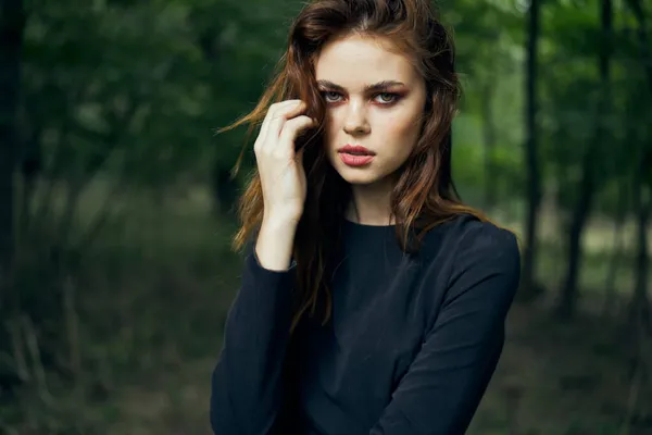 Woman in black dress in the forest Halloween Witch costume — Stock Photo, Image