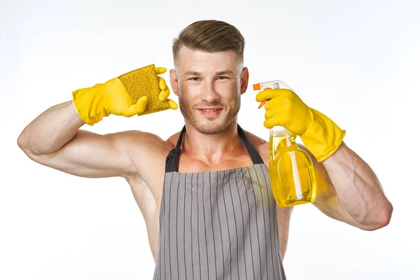 Desportivo muscular homem com detergente limpeza posando — Fotografia de Stock