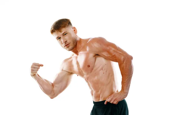 Man med en pumpad upp muskelmassa närbild träning bodybuilders — Stockfoto