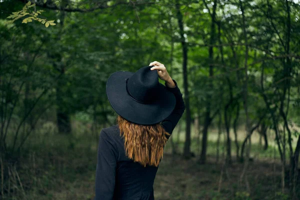 Cheerful woman witch in the forest posing fantasy — Stock Photo, Image