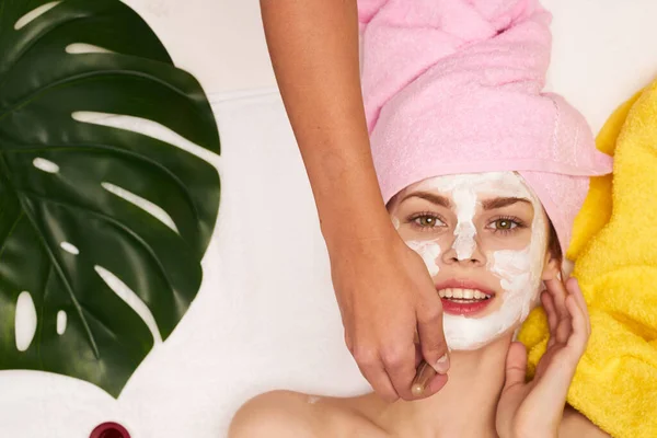 Cheerful woman spa treatments cosmetics beauty saloon view from above — Stock Photo, Image