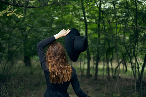 Cheerful woman witch in the forest posing fantasy — Stock Photo, Image