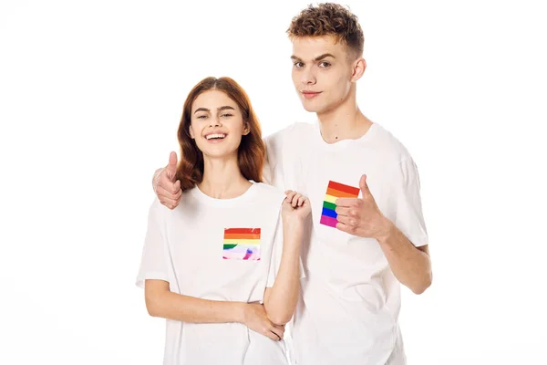 Joven pareja lgbt bandera transgénero estilo de vida luz fondo — Foto de Stock