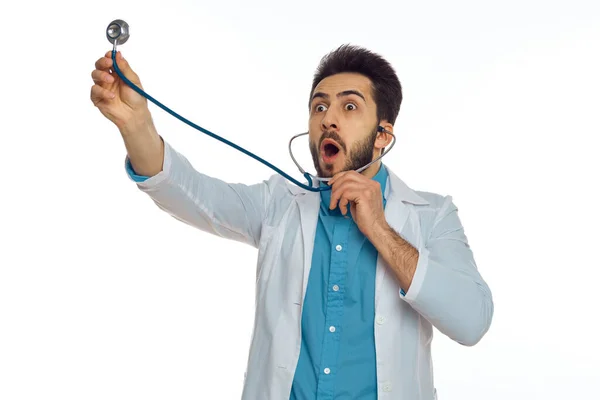 Άντρας γιατρός otoscope νοσοκομείο θεραπεία θεραπευτής φως φόντο — Φωτογραφία Αρχείου