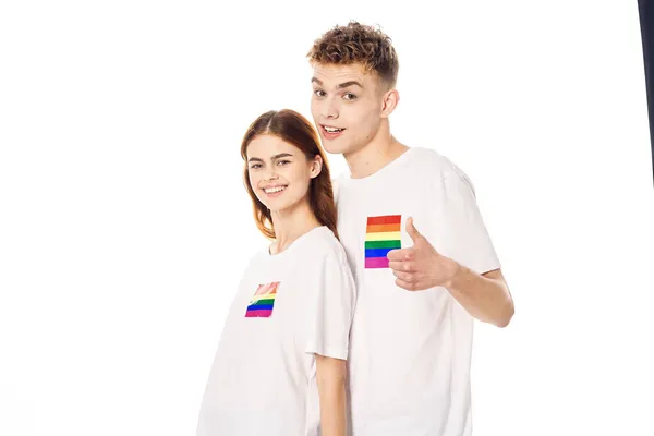 Joven pareja lgbt bandera transgénero estilo de vida luz fondo —  Fotos de Stock