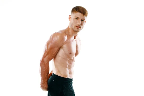 Atleta masculino com bombeamento de corpo muscular posando aptidão — Fotografia de Stock