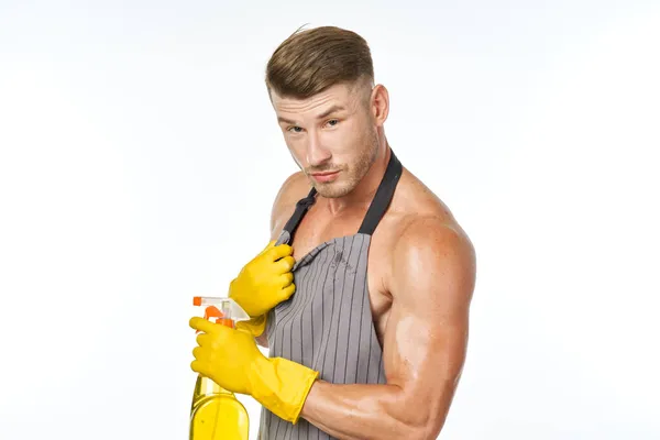 Mann in Schürze mit Gummihandschuhen hochgepumpt — Stockfoto