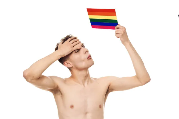 LGBTの旗のトランスジェンダーのコミュニティの差別を持つ男 — ストック写真