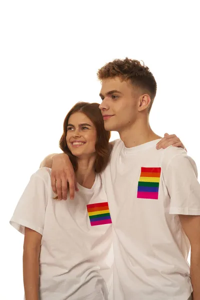 Pareja bandera lgbt transexual sexual minorías luz fondo — Foto de Stock