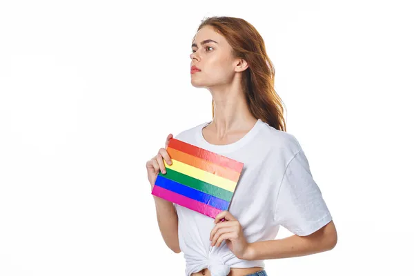 Woman wearing white t-shirt lgbt flag inventor community — ストック写真