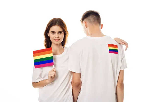 Pasangan muda lgbt Flag gaya hidup transgender latar belakang cahaya — Stok Foto