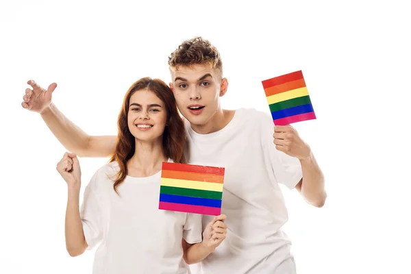 Couple Drapeau lgbt transgenre minorités sexuelles lumière arrière-plan — Photo