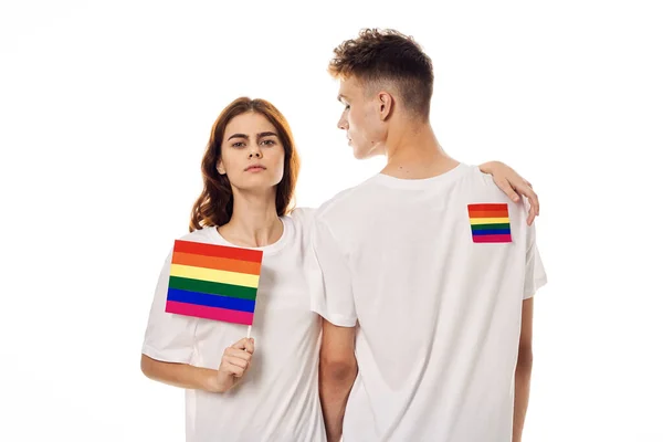 Couple Drapeau lgbt transgenre minorités sexuelles lumière arrière-plan — Photo