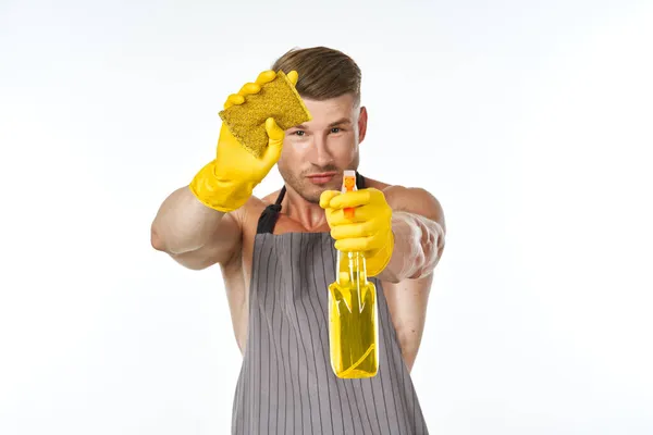 Sporty muscular man with detergent cleaning posing — Stock Photo, Image