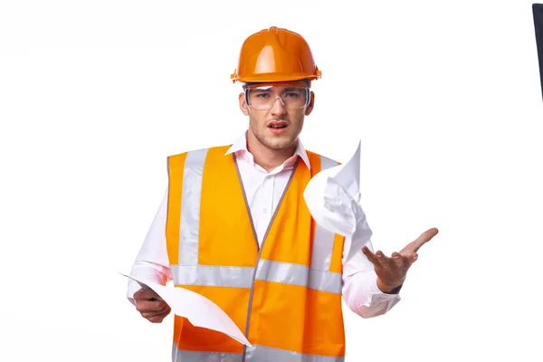 Инженер оранжевой защитной формы документы профессиональной работы — стоковое фото