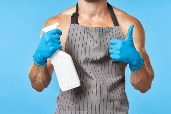 Janitor in apron with pumped up body posing service delivery — Stock Photo, Image