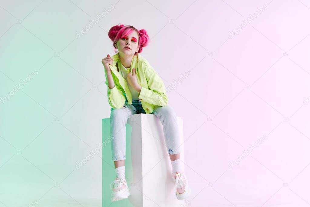 glamorous fashionable woman with pink hair posing hipster neon