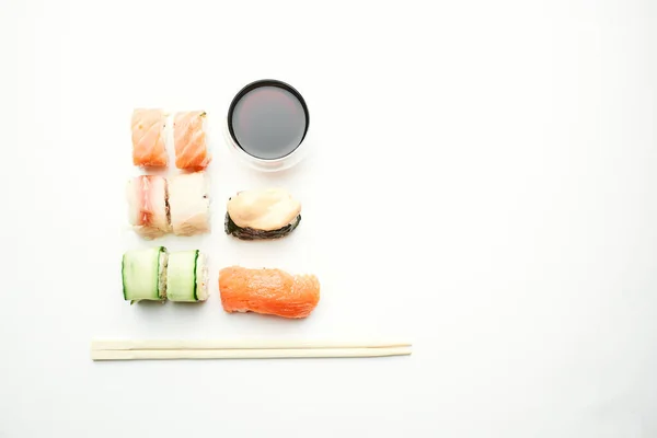 Sushi chopsticks soy sauce snack delicacy japanese cuisine — Stock Photo, Image