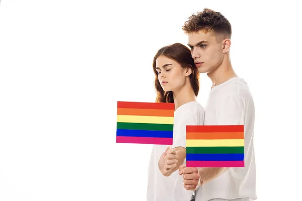 Jovem casal lgbt Bandeira transexual estilo de vida luz fundo — Fotografia de Stock