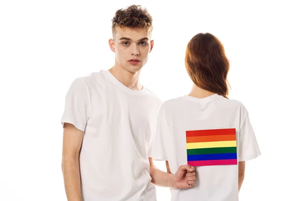 Joven pareja lgbt bandera transgénero estilo de vida luz fondo — Foto de Stock
