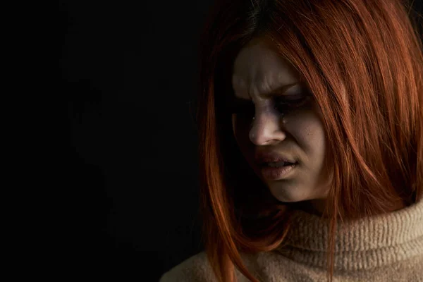 Red-haired woman with bruises under her eyes scared crying depression — Stock Photo, Image