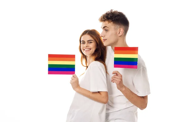 Joven pareja lgbt bandera transgénero estilo de vida luz fondo — Foto de Stock