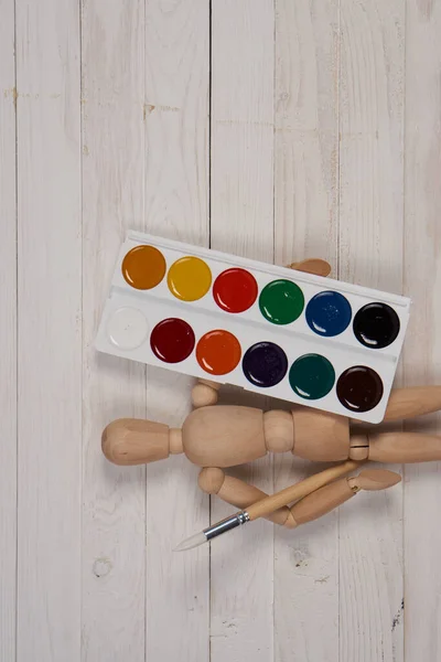 Aquarelverf veelkleurige stickers tekenen items houten achtergrond — Stockfoto